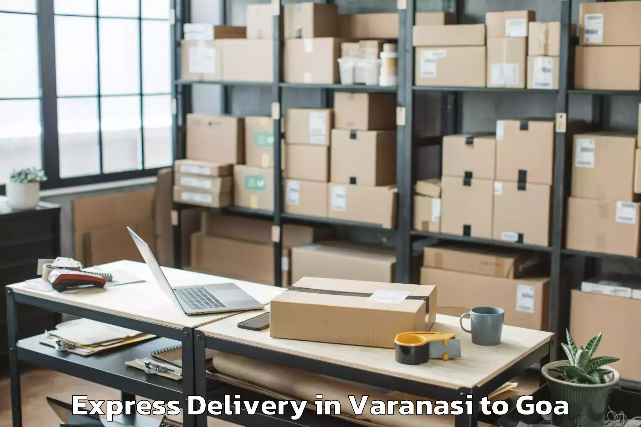 Book Varanasi to Chandor Express Delivery Online